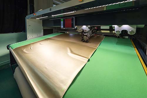 Machine cutting Herculite fabric