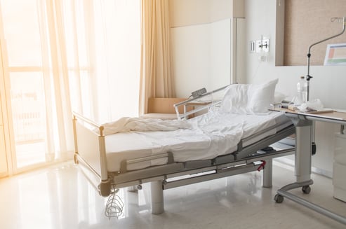 Hospital bed with medical fabric
