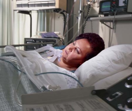 Woman Hospital Bed