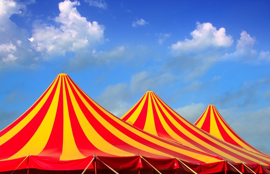Carnival tents with blue sky in the background